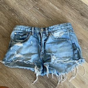 Distressed denim shorts